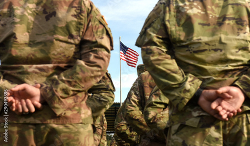 American Soldiers and Flag of USA. US Army. Veteran Day