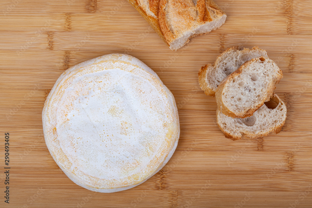French cow's milk cheese called reblochon with bread French cow's milk cheese called reblochon with bread