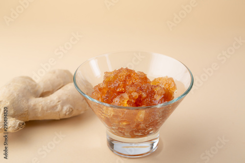 Ginger fruit jam in glass, food close-up