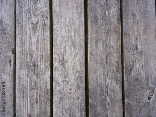 Background of old wood. Old wooden construction. Natural aging.