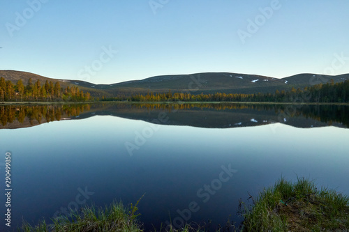 Mountains reflection to water