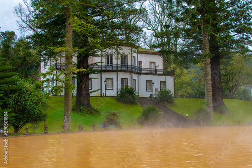 Hot water and natural sulfur pool in a garden in Furnas area, São Miguel Island, Azores photo