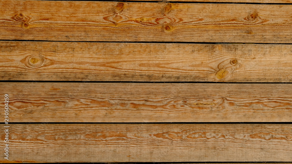 Fototapeta premium Fence from the boards. Wood texture. Background for interior design.