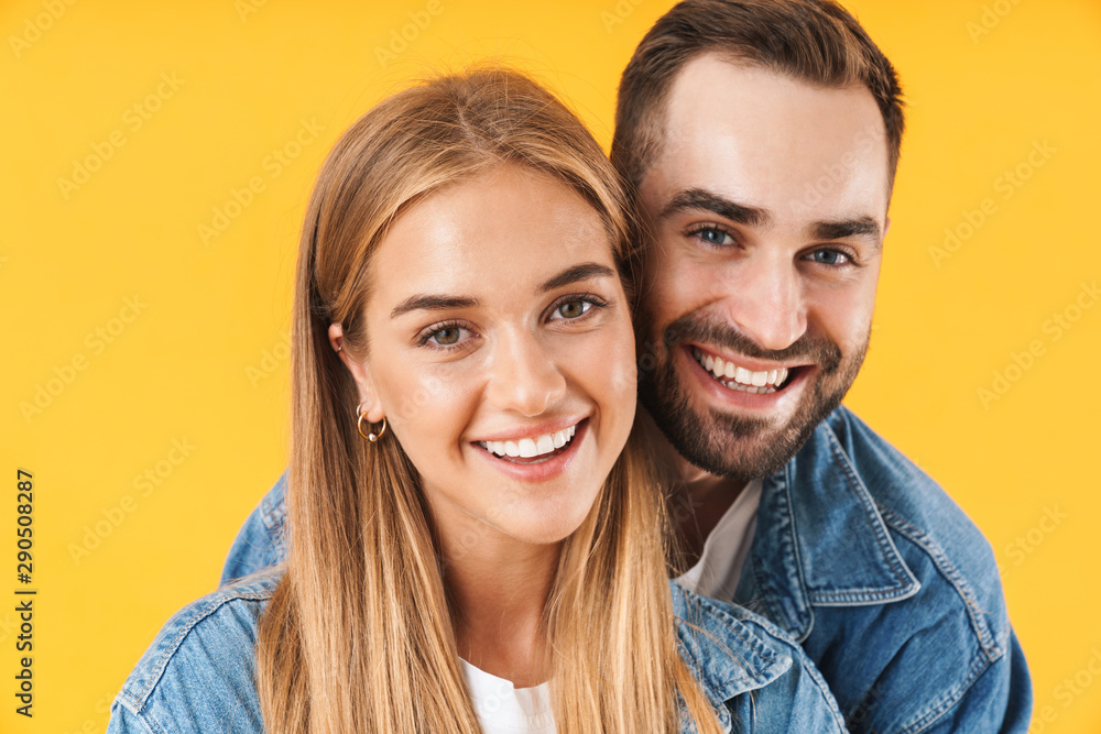 Image closeup of adorable couple man and woman smiling at camera Image closeup of adorable couple man and woman smiling at camera