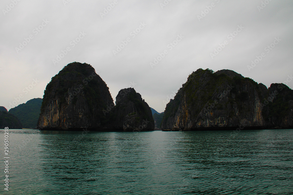 Cliffs out of the water in the bay near Cat Ba island in Vietnam