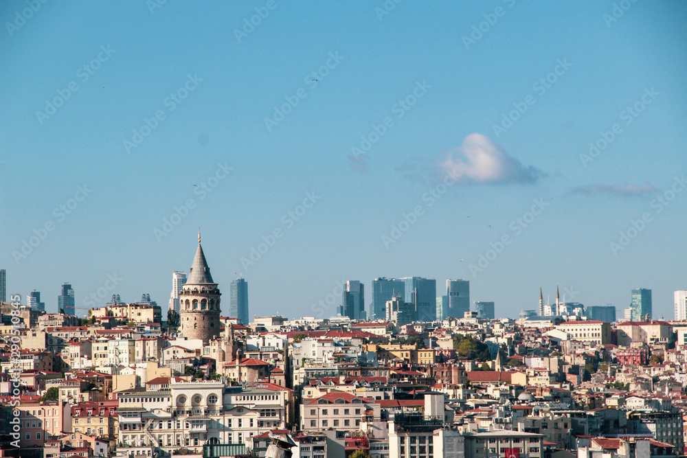 Galata Tower and Mosque dome silhouette with Bosphorus landscape in Golden Horn of Istanbul city in Turkey and the sea of Marmara 