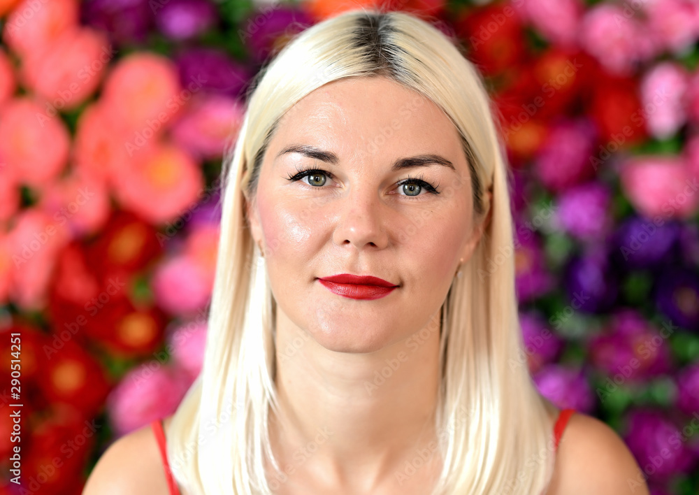 Close-up portrait of a pretty caucasian woman with blond hair on a colored background. Great makeup, good facial skin. Close-up portrait of a pretty caucasian woman with blond hair on a colored background. Great makeup, good facial skin.