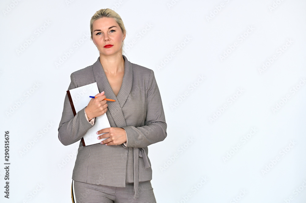 Portrait of a pretty caucasian woman manager with blond hair in a business suit on a white background. It stands right in front of the camera, with emotions in various poses. Portrait of a pretty caucasian woman manager with blond hair in a business suit on a white background. It stands right in front of the camera, with emotions in various poses.