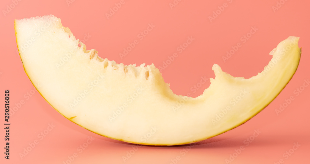 Ripe tasty melon on a pink background Ripe tasty melon on a pink background