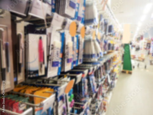 Blurred background of school supplies in a supermarket, back to school concept © Delphotostock