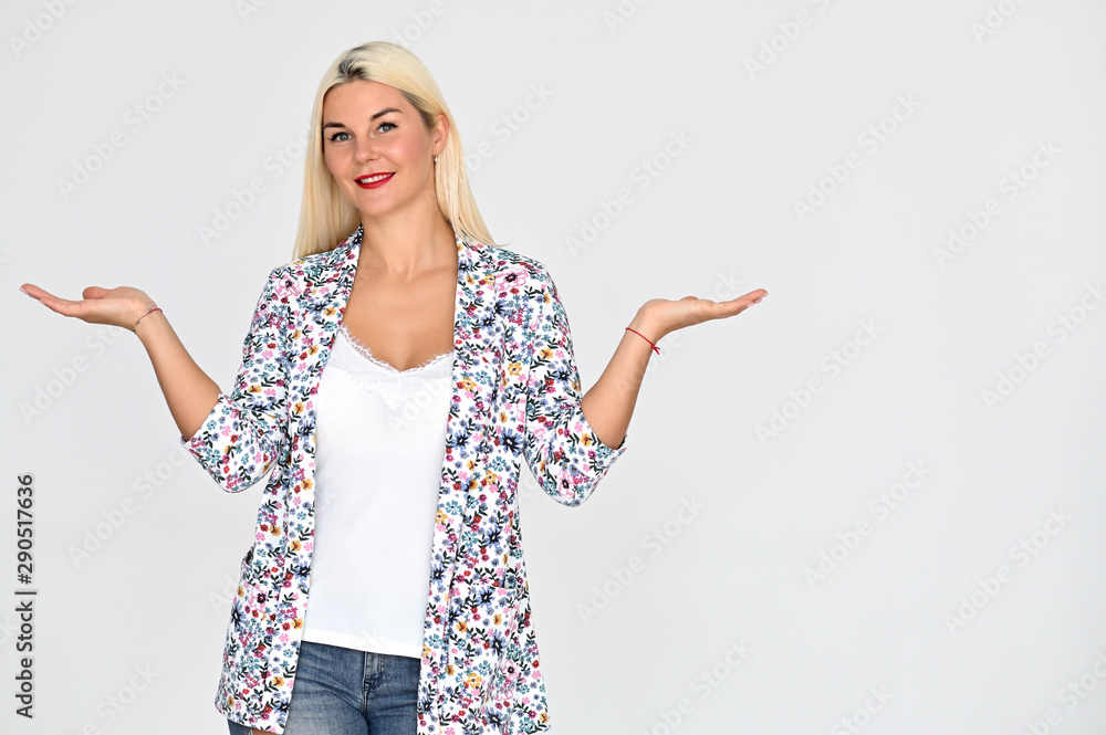 Portrait of a pretty caucasian woman with blond hair in bright clothes on a white background. It stands right in front of the camera, with emotions in various poses. Portrait of a pretty caucasian woman with blond hair in bright clothes on a white background. It stands right in front of the camera, with emotions in various poses.