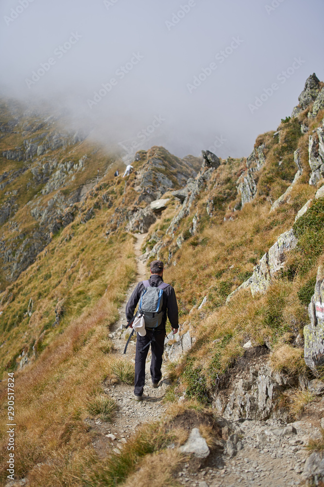 Man with backpack hiking