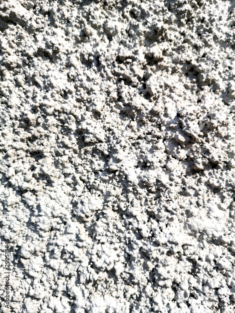 Concrete chips on the wall as abstract background Concrete chips on the wall as abstract background