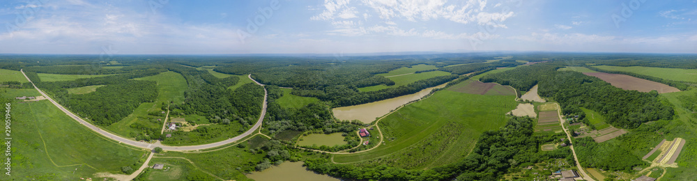 Aerial Caucasus forest panoramic background, green fields and lake Aerial Caucasus forest panoramic background, green fields and lake