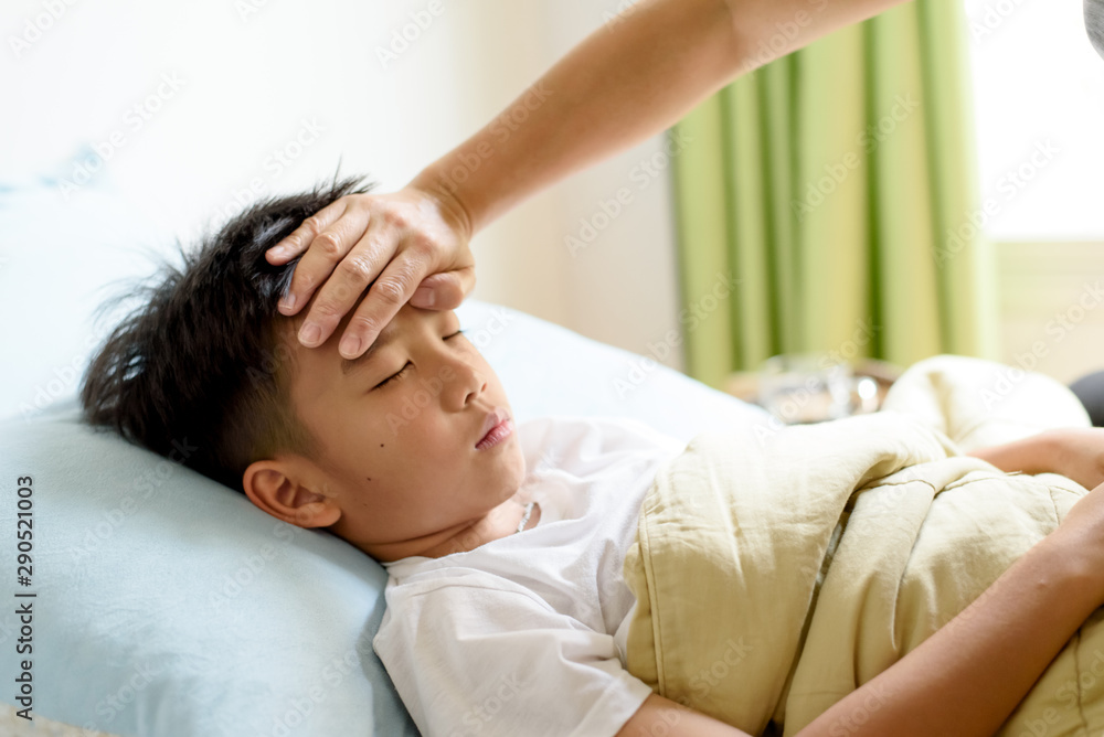 Young boy sick and sleep on the bed Young boy sick and sleep on the bed