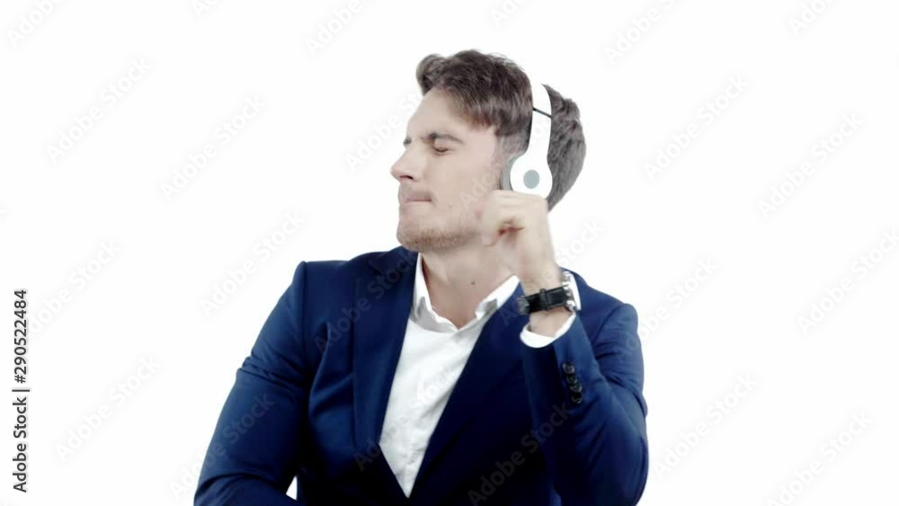businessman in headphones dancing isolated on white businessman in headphones dancing isolated on white