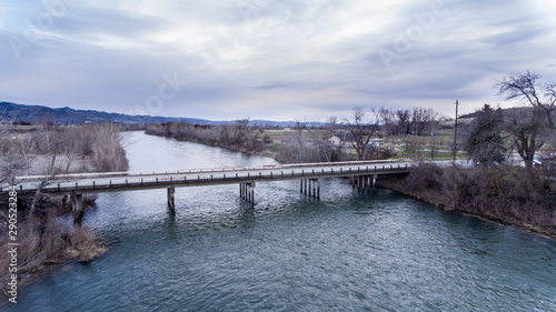 Wallpaper Mural drone shot of a bridge going over water during the winter time Torontodigital.ca