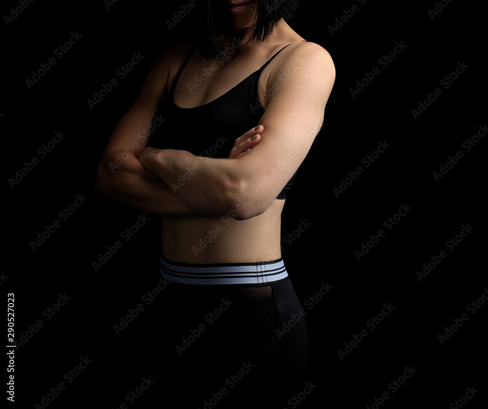 body of a girl of athletic appearance in a black bra body of a girl of athletic appearance in a black bra
