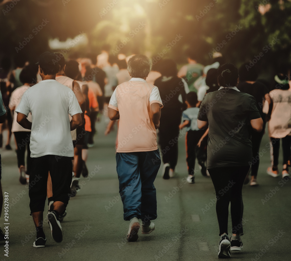 A group of people running to maintain wellness