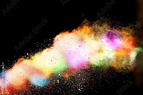 Explosion of colored powder isolated on black background. Abstract colored background. holi festival.