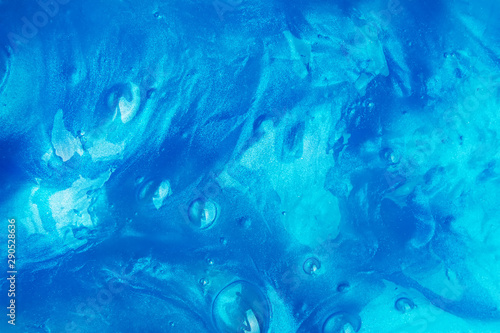 Fotografia Abstract blue background with texture of slime or other liquid
