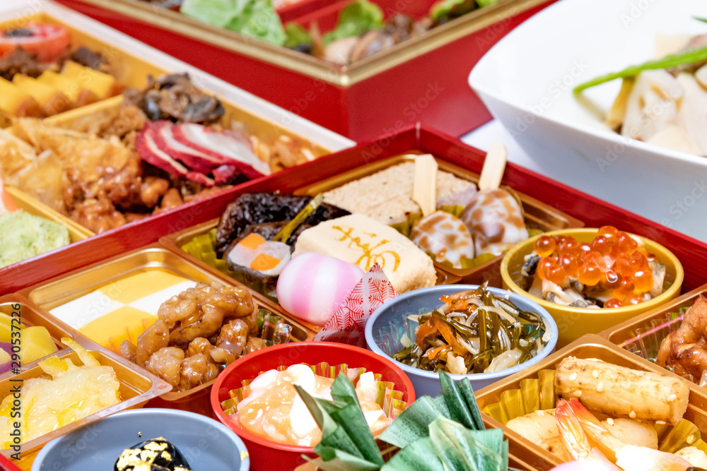 boxes with New Year dishes japanese food (osechi)
