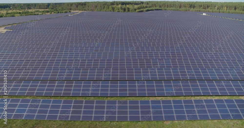 Solar panel farm Aerial view 4K. Alternative Renewable sun energy power plant. Solar panel farm Aerial view 4K. Alternative Renewable sun energy power plant.