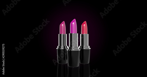 Colourful lipsticks in metallic container against black background