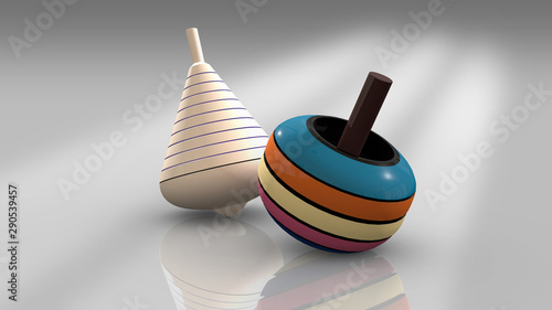 Colorful spinning tops (toys or lattoo) photo