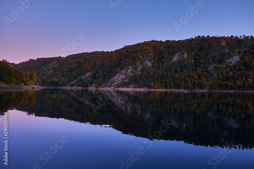 Autumn lake in Kamchatka among the mountains and forests. the nature of Kamchatka