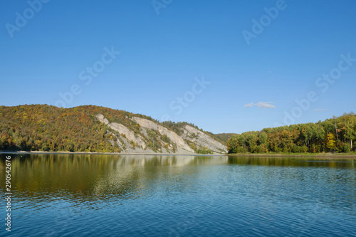 Autumn lake in Kamchatka among the mountains and forests. the nature of Kamchatka