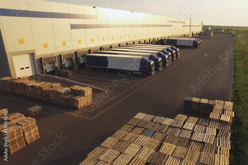 distribution warehouse with trucks of different capacity