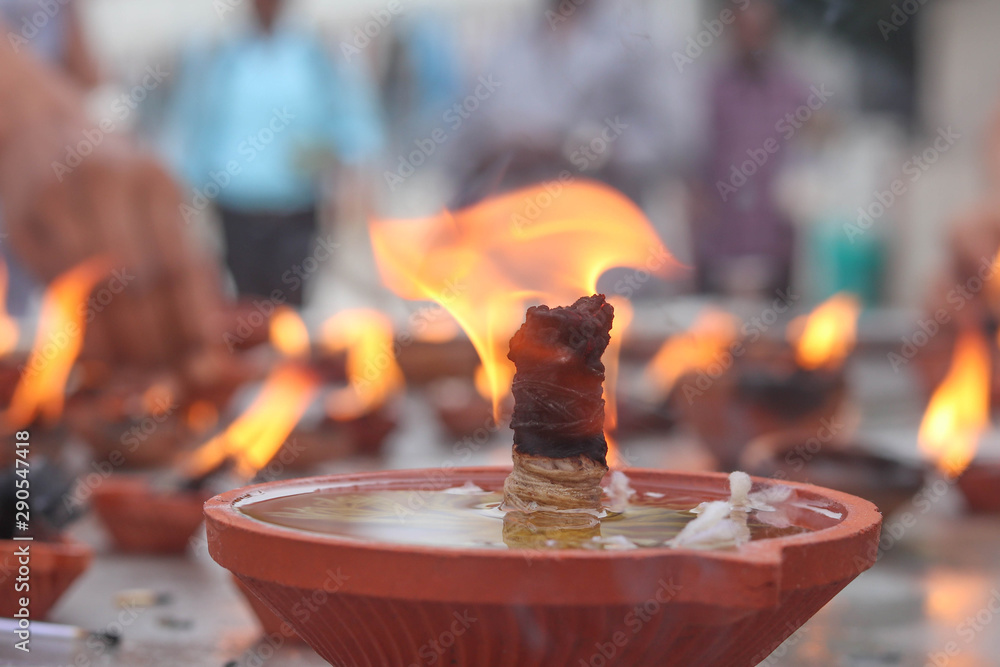 Naklejka premium Earthen Lamp Prayers offering to God in Temple