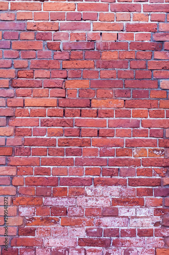 Red bricks background. A part of wall of the building