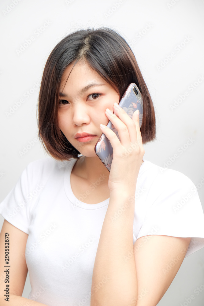 Attractive asian beautiful business women talking smartphone Attractive asian beautiful business women talking smartphone
