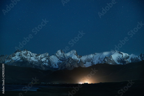 Mountain valley at night sky