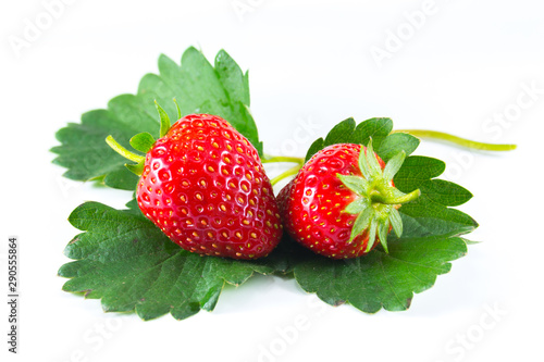 fresh strawberries with leaves on white background