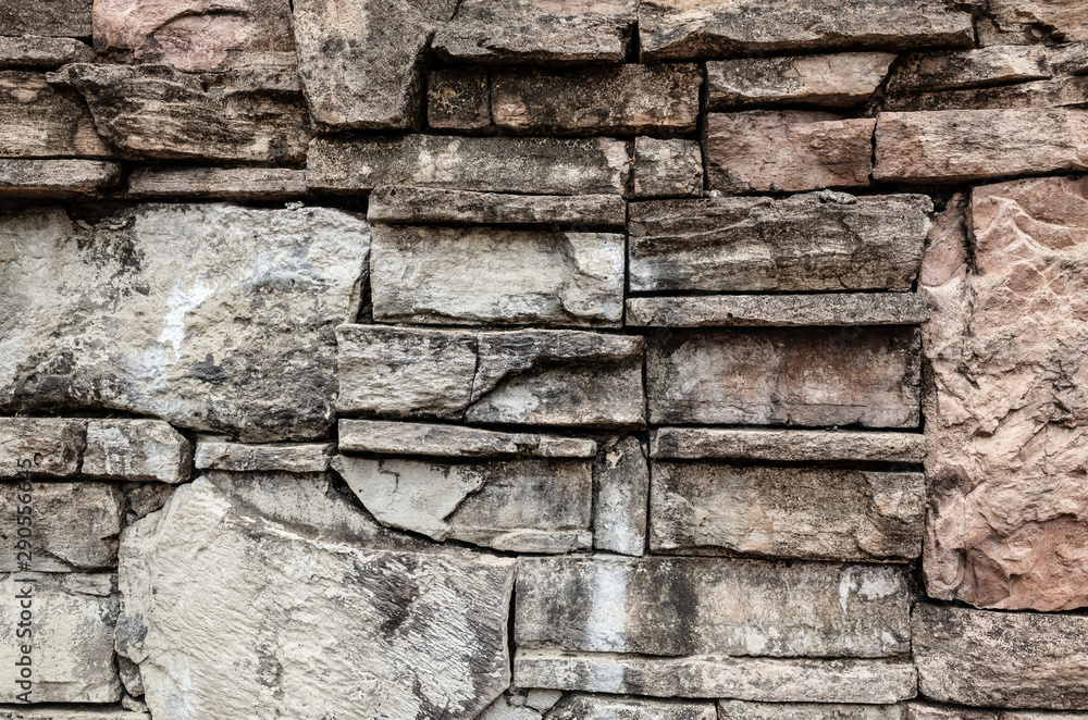Naklejka premium stone stacked wall background