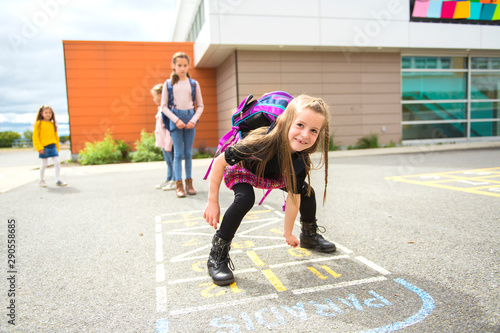 A Hopscotch on the schoolyard with friends play together