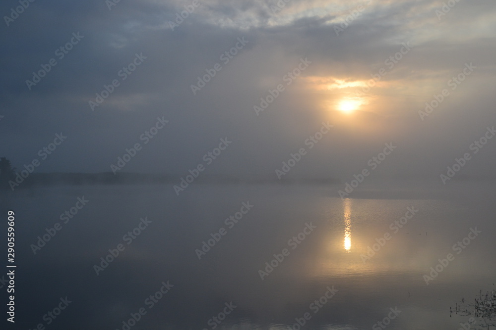 a sunrise at the lake