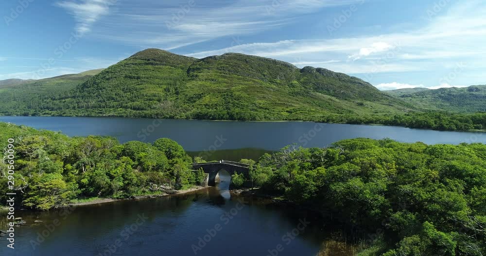 Arch bridge over lake in Killarney National Park, wide aerial Arch bridge over lake in Killarney National Park, wide aerial