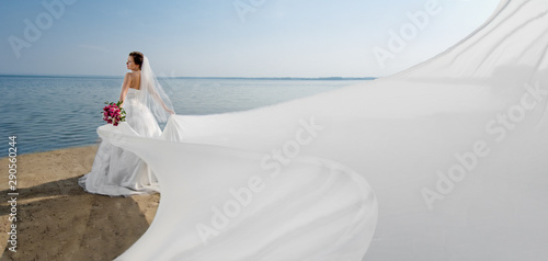 beautiful fiancee on shore sea