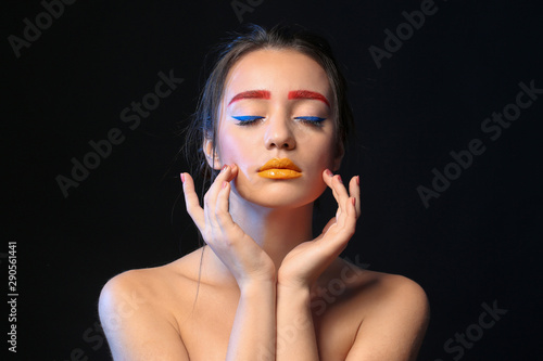 Young woman with dyed eyebr...