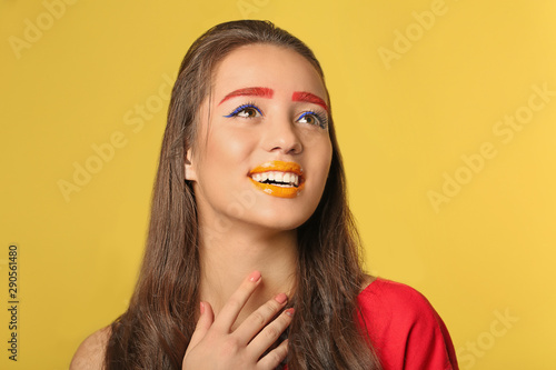 Young woman with dyed eyebr...