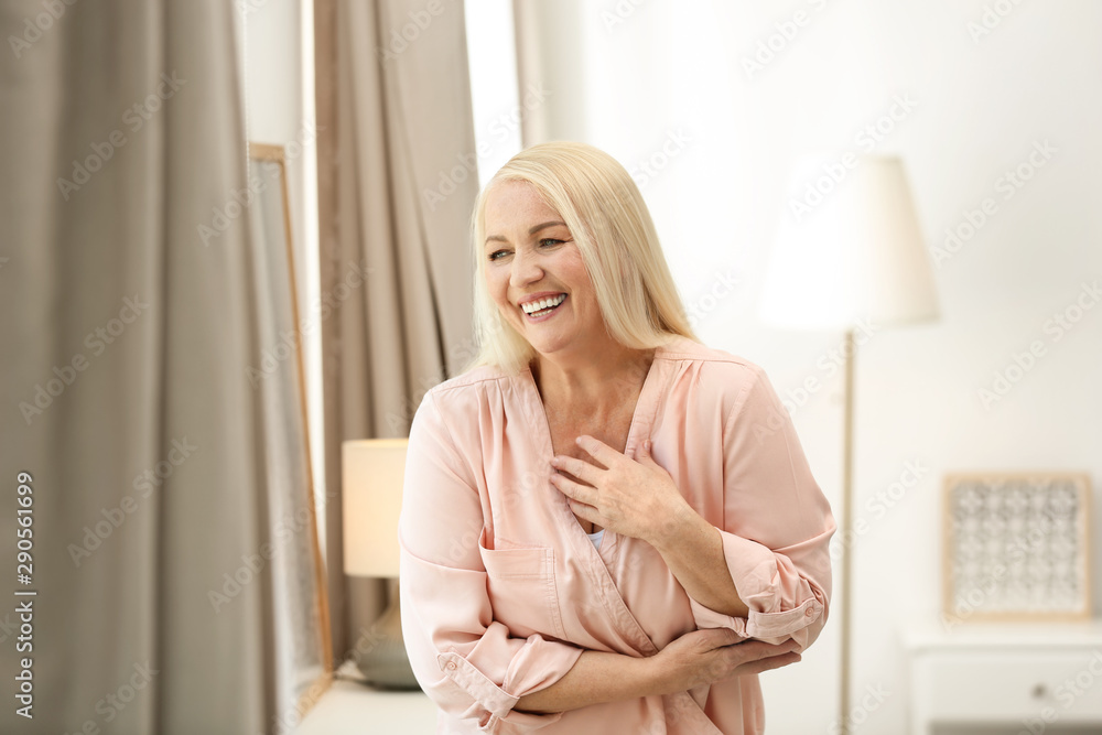 Portrait of happy mature woman at home Portrait of happy mature woman at home