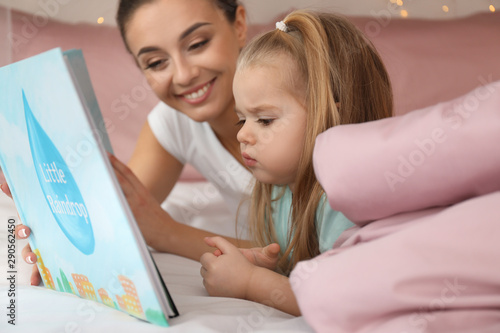Mother reading bedtime stor...