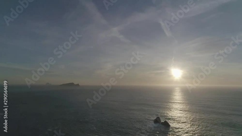 Ocean horizon sunset near Sibyl Head, wide aerial photo