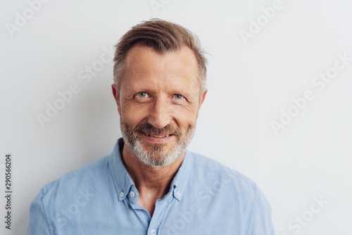 Portrait of a cheerful smiling bearded man
