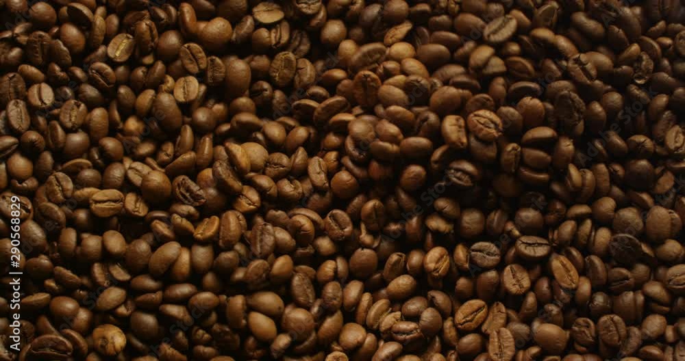 Coffee Beans Grinding Top Shot Close Up with Light Changing Red Camera Coffee Beans Grinding Top Shot Close Up with Light Changing Red Camera