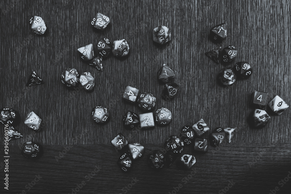 dice on table in black and white dice on table in black and white